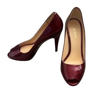 PRADA Peeptoe patent leather pumps